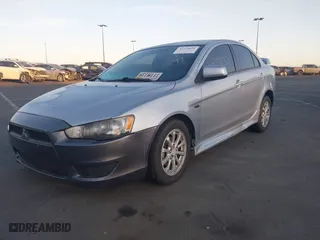 2012 Mitsubishi Lancer ES with VIN JA32U2FU1CU027013, listed as a IAAI auction lot 41739820 with 124,549 mi miles. Bid and sale history available at carsss.com. Image 2.