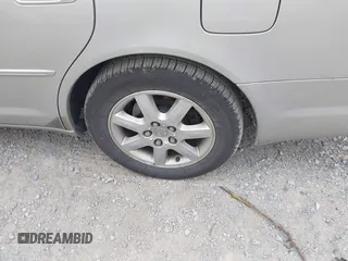 2001 Toyota Avalon XL z VIN 4T1BF28B01U175072, wystawiony jako IAAI lot #42114046 z przebiegiem 208 283 mil mil oraz . Historia ofert i sprzedaży dostępna na DreamBid. Obrazek 12.