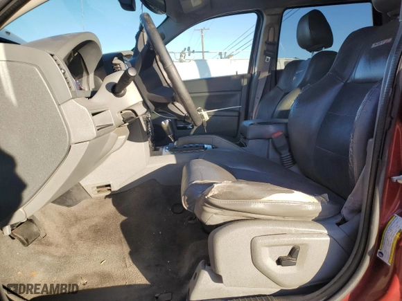 2007 Jeep Grand Cherokee SRT-8 with VIN 1J8HR78337C662589, listed as a Copart auction lot 81880564 with 257,953 mi miles and Salvage Title. Bid and sale history available at carsss.com. Image 7.