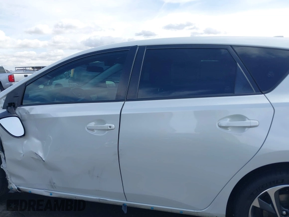 2016 Scion iM with VIN JTNKARJE4GJ517791, listed as a IAAI auction lot 41806605 with 140,956 mi miles. Bid and sale history available at carsss.com. Image 14.