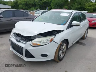 2014 Ford Focus SE with VIN 1FADP3K24EL209329, listed as a IAAI auction lot 42223749 with 141,196 mi miles and . Bid and sale history available at carsss.com. Image 2.