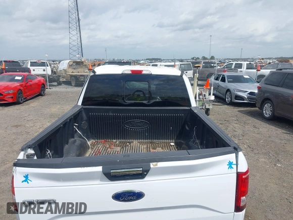 2017 Ford F-150 XL with VIN 1FTEW1EF0HKC79134, listed as a IAAI auction lot 41909992 with 241,488 mi miles and . Bid and sale history available at DreamBid. Image 8.