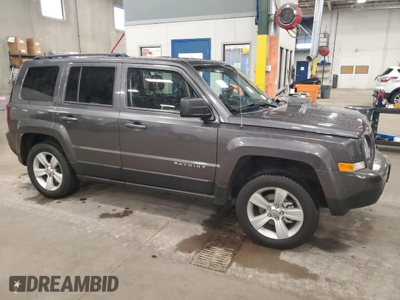 2016 Jeep Patriot High Altitude with VIN 1C4NJRFB5GD697474, listed as a Copart auction lot 57881215 with 152,127 mi miles and Salvage title. Bid and sale history available at DreamBid. Image 4.