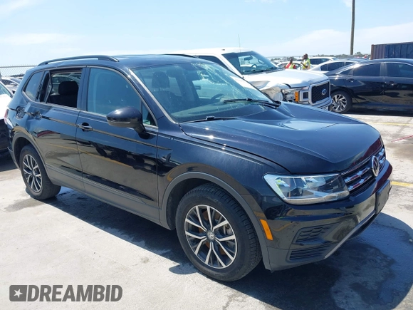 2021 Volkswagen Tiguan S with VIN 3VV1B7AX9MM067347, listed as a IAAI auction lot 42305101 with 77,042 mi miles and . Bid and sale history available at DreamBid. Image 1.