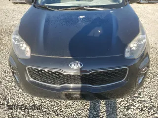 2017 Kia Sportage LX z VIN KNDPMCAC8H7235813, wystawiony jako Copart lot #52716515 z przebiegiem 135 221 mil mil oraz Szkoda całkowita • Salvage title. Historia ofert i sprzedaży dostępna na DreamBid. Obrazek 11.