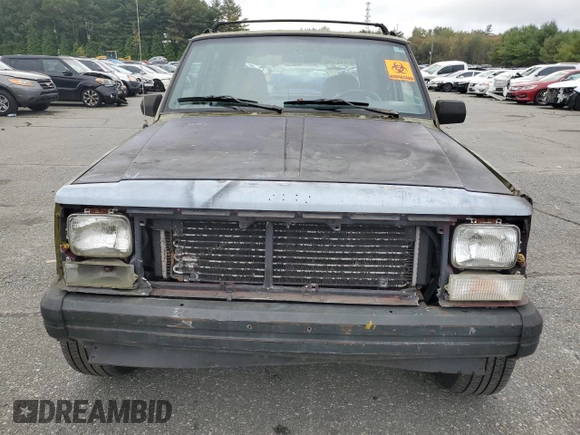 1996 Jeep Cherokee Sport with VIN 1J4FJ68S9TL291661, listed as a Copart auction lot 71968934 with 139,695 mi miles and Salvage Title. Bid and sale history available at carsss.com. Image 5.