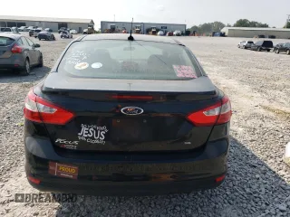 2013 Ford Focus SE z VIN 1FADP3F20DL330366, wystawiony jako Copart lot #59204595 z przebiegiem 163 305 mil mil oraz Szkoda całkowita • Salvage title. Historia ofert i sprzedaży dostępna na DreamBid. Obrazek 6.