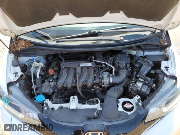 2015 Honda Fit EX-L z VIN 3HGGK5H81FM734945, wystawiony jako Copart lot #61920835 z przebiegiem 59 891 mil mil oraz Szkoda całkowita • Salvage title. Historia ofert i sprzedaży dostępna na DreamBid. Obrazek 11.