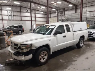 2009 Dodge Dakota Bighorn/Lonestar with VIN 1D3HW32P79S819674, listed as a IAAI auction lot 41962369 with 157,399 mi miles and . Bid and sale history available at carsss.com. Image 18.