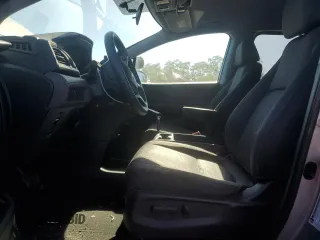 2018 Honda Odyssey LX with VIN 5FNRL6H22JB087152, listed as a Copart auction lot 76754974 with 73,057 mi miles and Salvage Title. Bid and sale history available at carsss.com. Image 7.