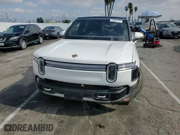 2025 Rivian R1S Adventure z VIN 7PDSGBBA1SN051768, wystawiony jako Copart lot #43838115 z przebiegiem 4875 mil mil oraz Szkoda całkowita • Salvage title. Historia ofert i sprzedaży dostępna na DreamBid. Obrazek 11.
