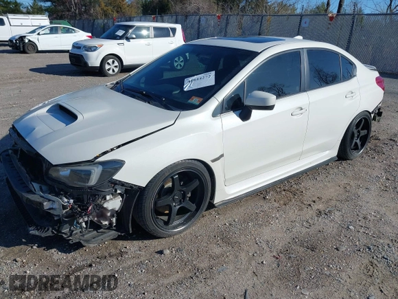 2015 Subaru WRX Premium with VIN JF1VA1D64F9814394, listed as a IAAI auction lot 41844272 with 118,415 mi miles. Bid and sale history available at carsss.com. Image 2.