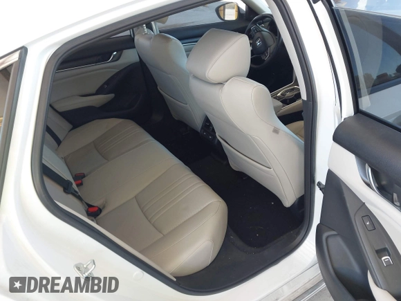2022 Honda Accord Touring with VIN 1HGCV3F90NA011671, listed as a IAAI auction lot 42743890 with 76,728 mi miles and . Bid and sale history available at DreamBid. Image 8.