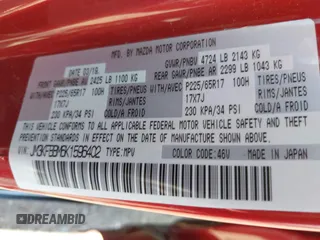 2019 Mazda CX-5 Sport with VIN JM3KFBBM6K1596402, listed as a IAAI auction lot 41971766 with 60,396 mi miles and . Bid and sale history available at DreamBid. Image 9.