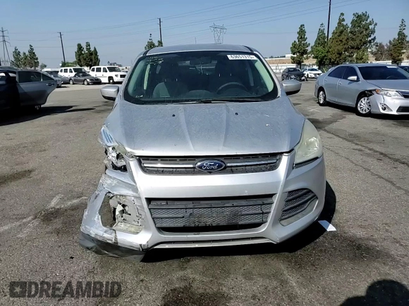2013 Ford Escape SE with VIN 1FMCU9G91DUA14350, listed as a Copart auction lot 63651315 with 165,414 mi miles and Salvage title. Bid and sale history available at DreamBid. Image 13.