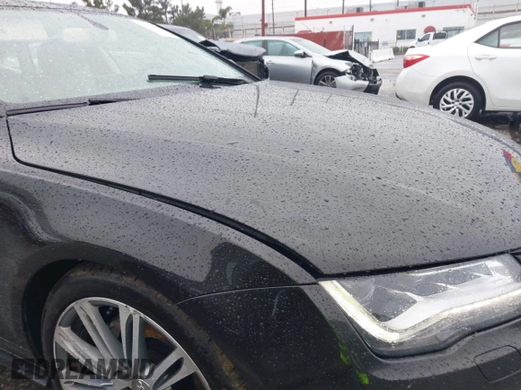 2014 Audi A7 3.0 Prestige with VIN WAU2GAFC5EN090233, listed as a IAAI auction lot 41565942 with 199,890 mi miles. Bid and sale history available at carsss.com. Image 19.