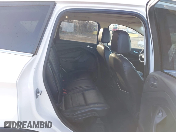 2017 Ford Escape Titanium with VIN 1FMCU9J98HUA04994, listed as a IAAI auction lot 41139988 with 136,989 mi miles. Bid and sale history available at carsss.com. Image 8.