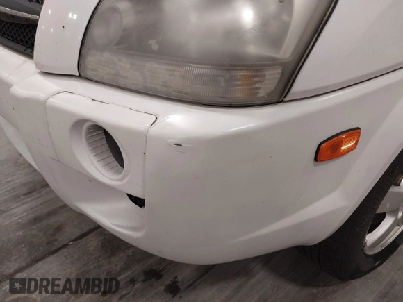 2006 Hyundai Tucson GL with VIN KM8JM72BX6U465737, listed as a IAAI auction lot 42203453 with 162,107 mi miles. Bid and sale history available at carsss.com. Image 12.