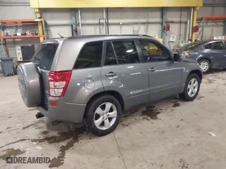 2010 Suzuki Grand Vitara Limited with VIN JS3TD0D76A4100026, listed as a IAAI auction lot 41622236 with 97,264 mi miles. Bid and sale history available at carsss.com. Image 4.