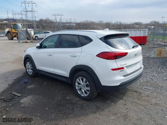 2019 Hyundai Tucson Value with VIN KM8J3CA42KU013032, listed as a IAAI auction lot 41880465 with 51,332 mi miles. Bid and sale history available at carsss.com. Image 3.