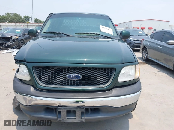 2001 Ford F-150 XL z VIN 1FTZX17201NA28384, wystawiony jako IAAI lot #39496964 z przebiegiem 65 695 mil mil oraz . Historia ofert i sprzedaży dostępna na DreamBid. Obrazek 12.
