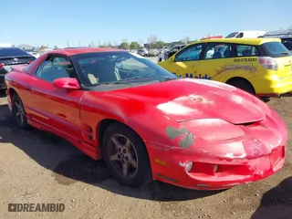 1999 Pontiac Firebird with VIN 2G2FS22K9X2208387, listed as a IAAI auction lot 41349447 with 221,291 mi miles. Bid and sale history available at carsss.com. Image 6.