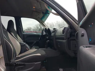 2003 Jeep Liberty Sport with VIN 1J4GL48K03W719229, listed as a IAAI auction lot 41130590 with 261,650 mi miles. Bid and sale history available at carsss.com. Image 5.