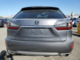 2019 Lexus RX with VIN 2T2ZZMCAXKC138738, listed as a Copart auction lot 42604515 with 60,604 mi miles and Salvage Title. Bid and sale history available at carsss.com. Image 6.