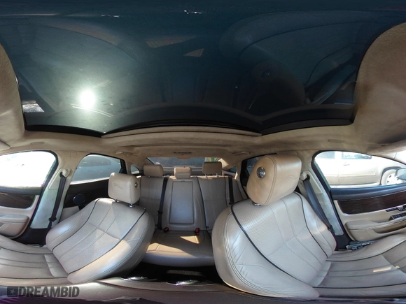 2011 Jaguar XJ with VIN SAJWA1CB8BLV05958, listed as a IAAI auction lot 40799422 with 80,193 mi miles. Bid and sale history available at carsss.com. Image 18.