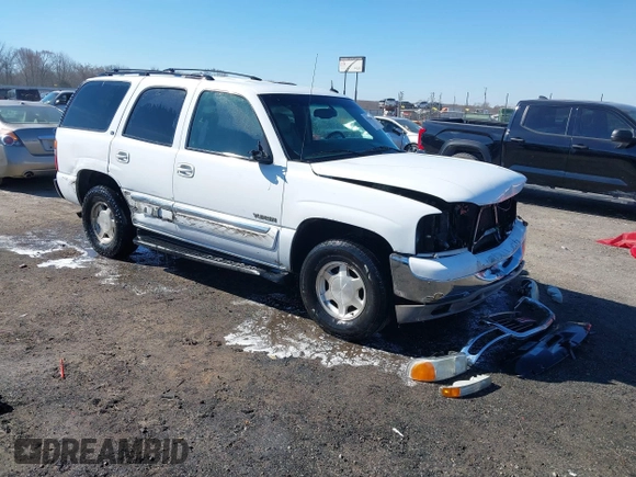 2003 GMC Yukon SLT with VIN 1GKEC13Z13J197955, listed as a IAAI auction lot 41586841 with 208,752 mi miles. Bid and sale history available at carsss.com. Image 1.