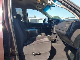 2005 Dodge 1500 SLT with VIN 1D7HU18D75S108492, listed as a IAAI auction lot 42030624 with 213,834 mi miles. Bid and sale history available at carsss.com. Image 5.