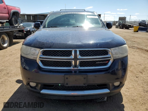 2013 Dodge Durango Crew z VIN 1C4RDJDG5DC651668, wystawiony jako Copart lot #57346645 z przebiegiem 164 987 mil mil oraz Szkoda całkowita • Salvage title. Historia ofert i sprzedaży dostępna na DreamBid. Obrazek 5.