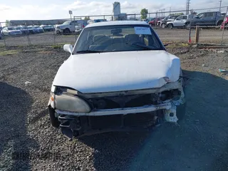 1995 Toyota Camry LE z VIN JT2SK12E5S0332027, wystawiony jako IAAI lot #42078977 z przebiegiem 128 929 mil mil oraz . Historia ofert i sprzedaży dostępna na DreamBid. Obrazek 13.