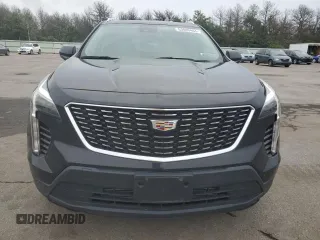2021 Cadillac XT4 AWD Luxury with VIN 1GYFZBR4XMF014647, listed as a Copart auction lot 63800444 with 49,724 mi miles and Salvage Title. Bid and sale history available at carsss.com. Image 5.