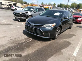 2018 Toyota Avalon Hybrid XLE Plus z VIN 4T1BD1EB1JU062378, wystawiony jako IAAI lot #41988148 z przebiegiem 128 220 mil mil oraz . Historia ofert i sprzedaży dostępna na DreamBid. Obrazek 2.
