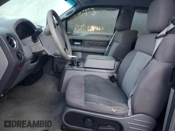 2004 Ford F-150 XLT with VIN 1FTRX12514KD37885, listed as a Copart auction lot 73998724 with 164,189 mi miles and Salvage Title. Bid and sale history available at carsss.com. Image 7.