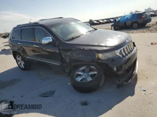 2013 Jeep Grand Cherokee Overland with VIN 1C4RJECT8DC556536, listed as a Copart auction lot 52758795 with 67,123 mi miles and Salvage Title. Bid and sale history available at carsss.com. Image 4.