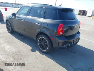 2015 MINI Countryman S z VIN WMWZC3C55FWT01471, wystawiony jako IAAI lot #42315283 z przebiegiem 93 206 mil mil oraz . Historia ofert i sprzedaży dostępna na DreamBid. Obrazek 3.