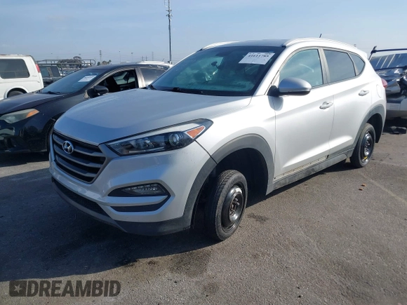 2016 Hyundai Tucson Sport with VIN KM8J33A20GU165154, listed as a IAAI auction lot 41611785 with Not Provided miles. Bid and sale history available at carsss.com. Image 16.