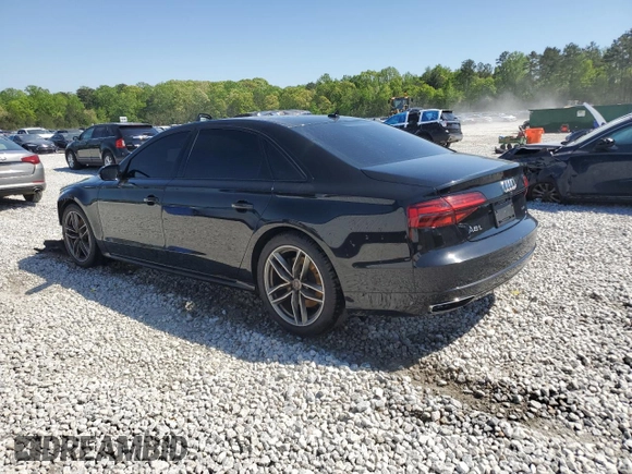 2017 Audi A8 with VIN WAU44AFD0HN006074, listed as a Copart auction lot 52421465 with 144,744 mi miles and Salvage title. Bid and sale history available at DreamBid. Image 2.