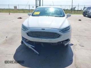 2018 Ford Fusion Titanium with VIN 3FA6P0RU3JR124007, listed as a IAAI auction lot 42207863 with 179,708 mi miles and . Bid and sale history available at DreamBid. Image 6.