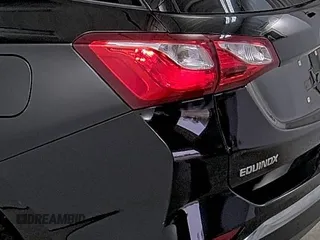 2021 Chevrolet Equinox LT with VIN 2GNAXTEV2M6107836, listed as a IAAI auction lot 42250066 with 55,167 mi miles and . Bid and sale history available at DreamBid. Image 3.