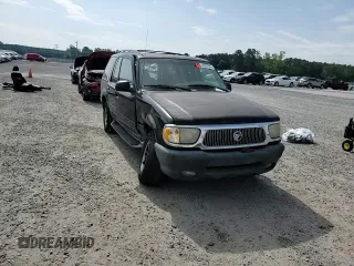 2001 Mercury Mountaineer z VIN 4M2ZU66E41UJ02651, wystawiony jako Copart lot #54207905 z przebiegiem 294 148 mil mil oraz Szkoda całkowita • Salvage title. Historia ofert i sprzedaży dostępna na DreamBid. Obrazek 14.