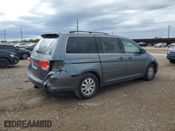 2010 Honda Odyssey EX-L with VIN 5FNRL3H72AB055070, listed as a Copart auction lot 80328974 with 221,467 mi miles and Salvage Title. Bid and sale history available at DreamBid. Image 3.