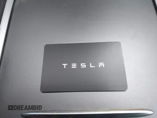 2023 Tesla Model Y Long Range with VIN 7SAYGDEE0PA183891, listed as a IAAI auction lot 42205573 with 41,273 mi miles and . Bid and sale history available at DreamBid. Image 11.