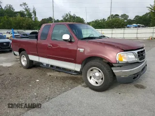 1999 Ford F-150 XL with VIN 1FTRX17LXXNA05552, listed as a Copart auction lot 60047025 with 193,122 mi miles and Salvage title. Bid and sale history available at DreamBid. Image 4.