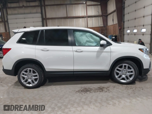2025 Honda Passport EX-L z VIN 5FNYF8H5XSB017943, wystawiony jako IAAI lot #42027857 z przebiegiem 1 822 mil mil oraz . Historia ofert i sprzedaży dostępna na DreamBid. Obrazek 13.