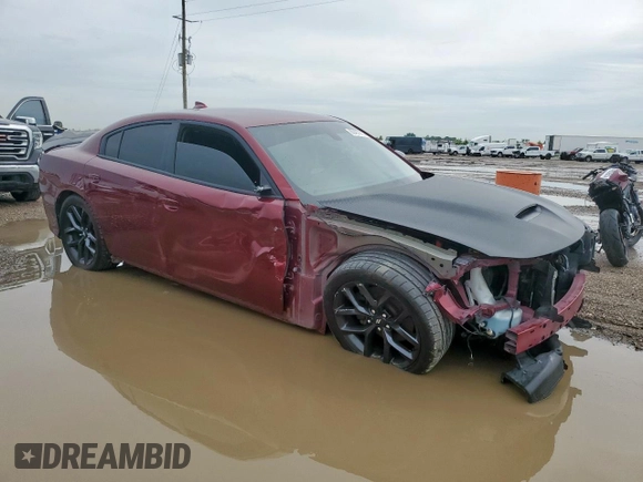 2021 Dodge Charger R/T with VIN 2C3CDXCT6MH504218, listed as a Copart auction lot 60407915 with 67,596 mi miles and Salvage title. Bid and sale history available at DreamBid. Image 4.