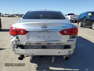 2014 Infiniti Q50 Hybrid Premium with VIN JN1AV7AP1EM692234, listed as a Copart auction lot 48697525 with 104,586 mi miles and Salvage Title. Bid and sale history available at DreamBid. Image 6.