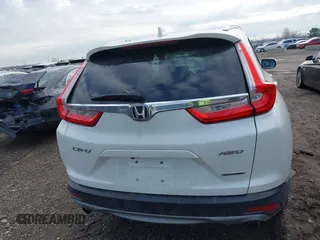 2017 Honda CR-V Touring with VIN 5J6RW2H92HL040217, listed as a IAAI auction lot 41044193 with 180,842 mi miles. Bid and sale history available at carsss.com. Image 16.